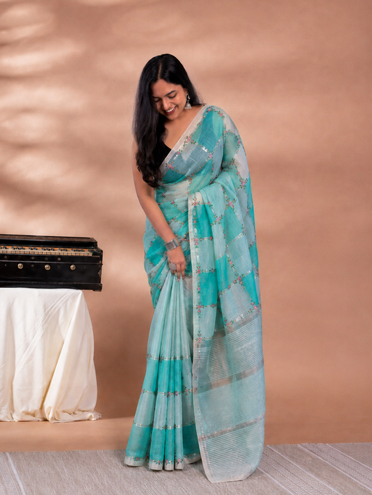 Teal Linen Tissue Embroidered saree