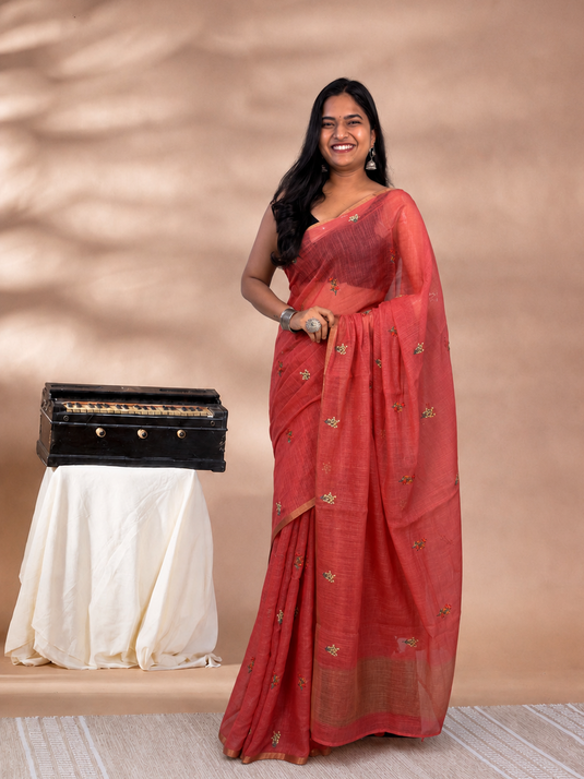 Orange Linen Embroidered Saree