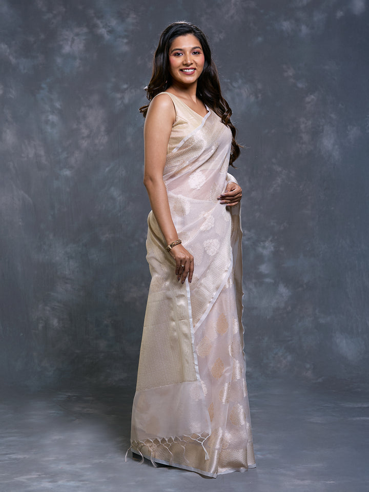 Beige Kota Tissue Zari Woven Saree
